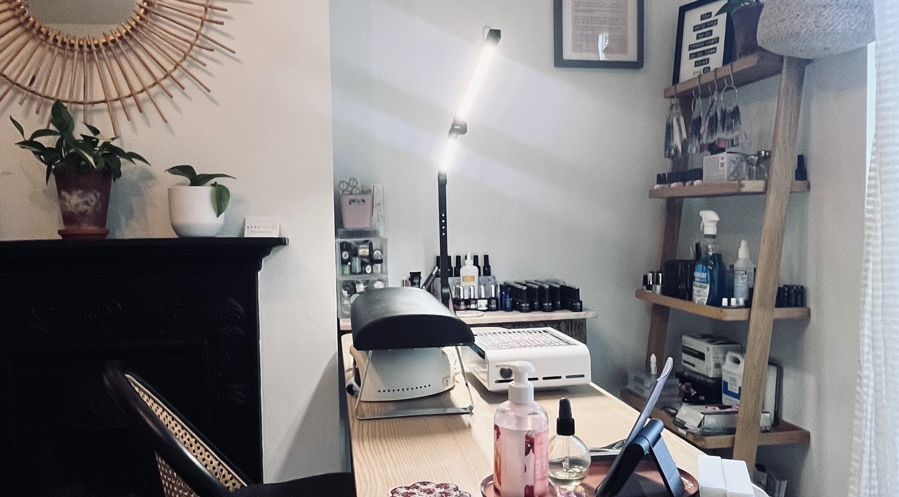 Stylish nail station at Thenailshed, Hurstpierpoint, England, GB, featuring manicure tools and decor.