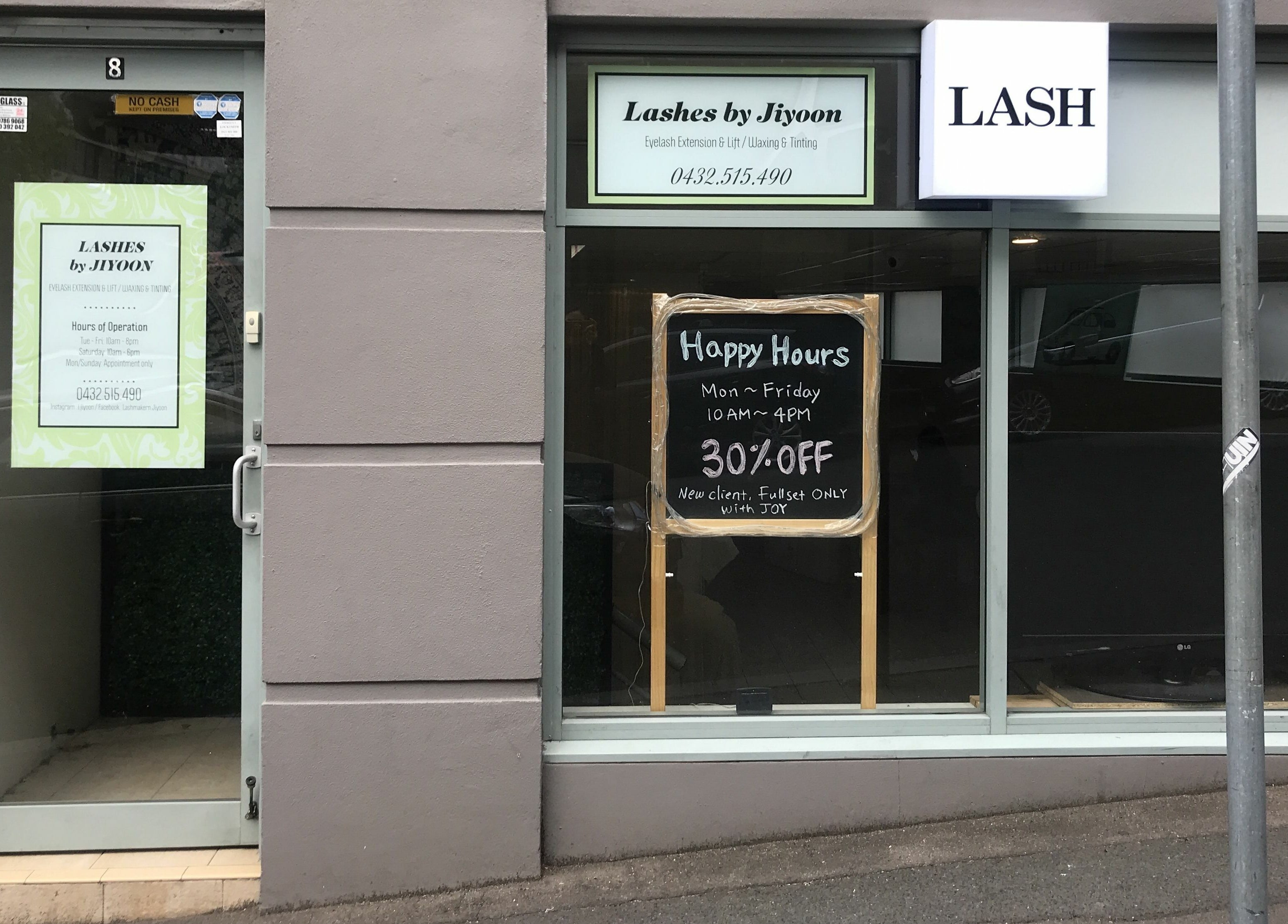 Exterior of Beyoutiful Studio showcasing 'Lashes by Jiyoon' sign and discounts in Pyrmont, New South Wales, AU.
