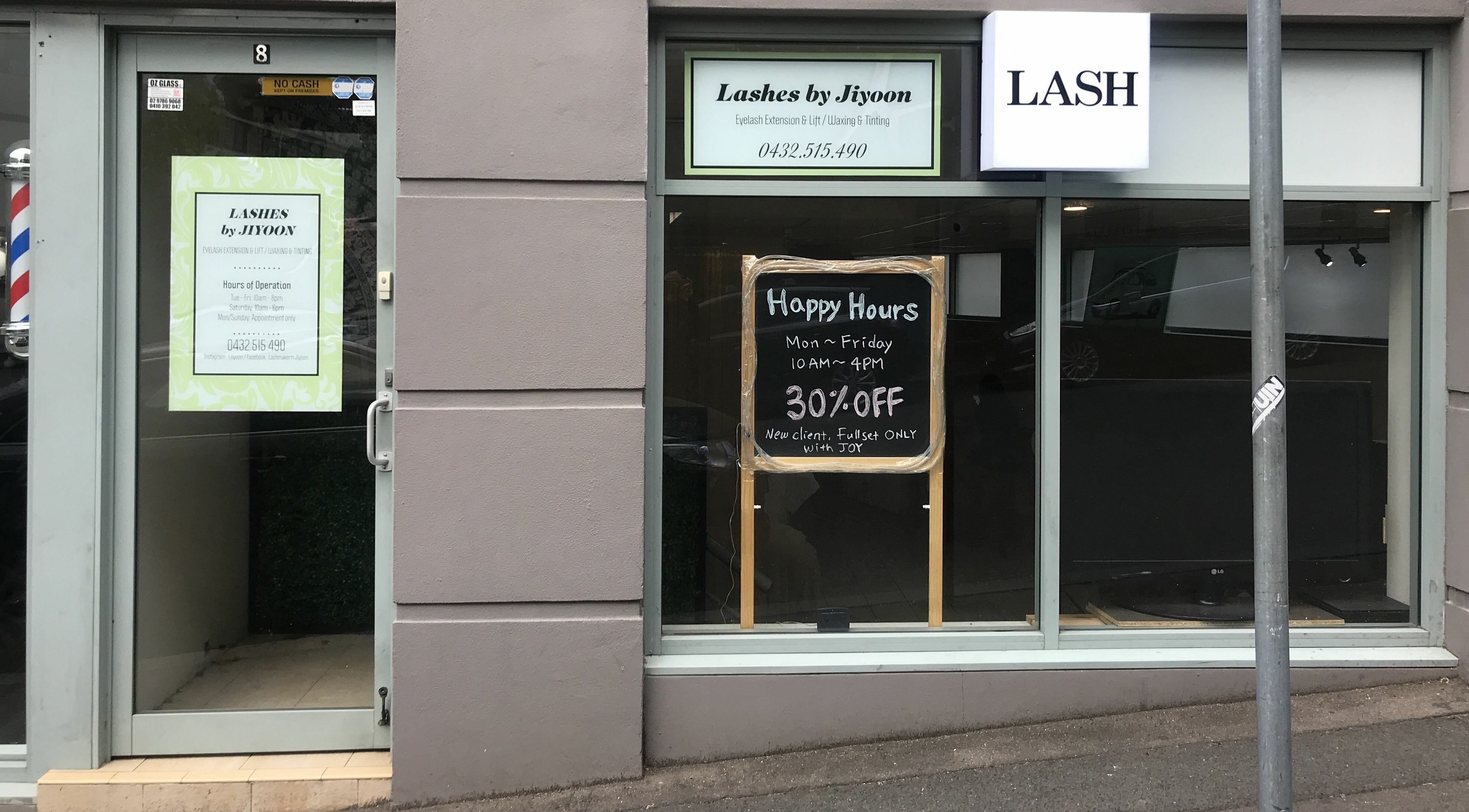 Exterior of Beyoutiful Studio showcasing 'Lashes by Jiyoon' sign and discounts in Pyrmont, New South Wales, AU.