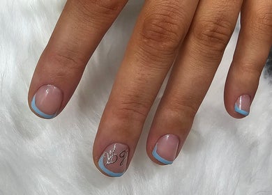 Nail art with blue tips at Khloes Beauty Room, Belfast, Northern Ireland, GB.
