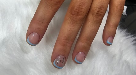 Nail art with blue tips at Khloes Beauty Room, Belfast, Northern Ireland, GB.