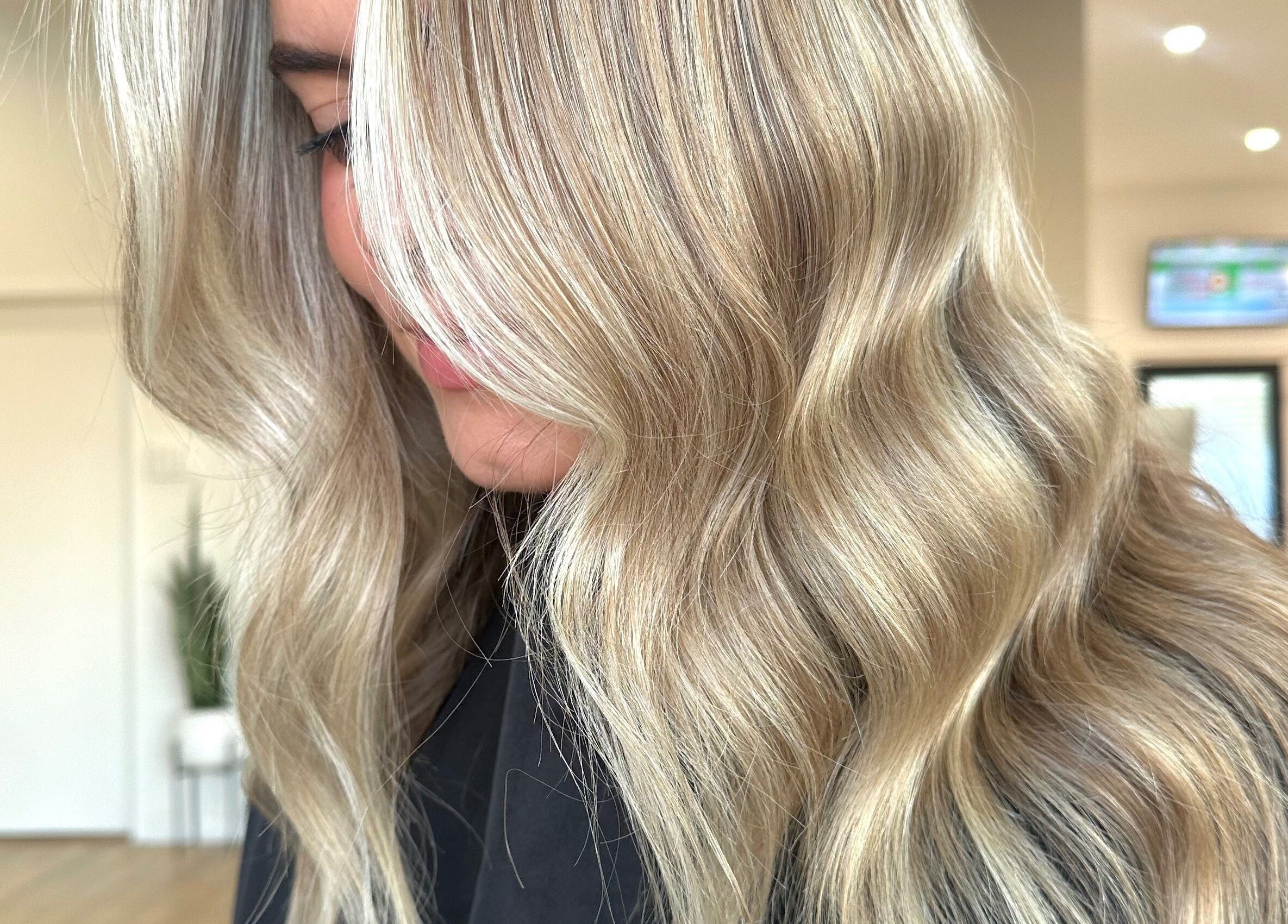 Stylish blonde waves hairstyle at Styled By Maddie, Ethelton, South Australia, AU.