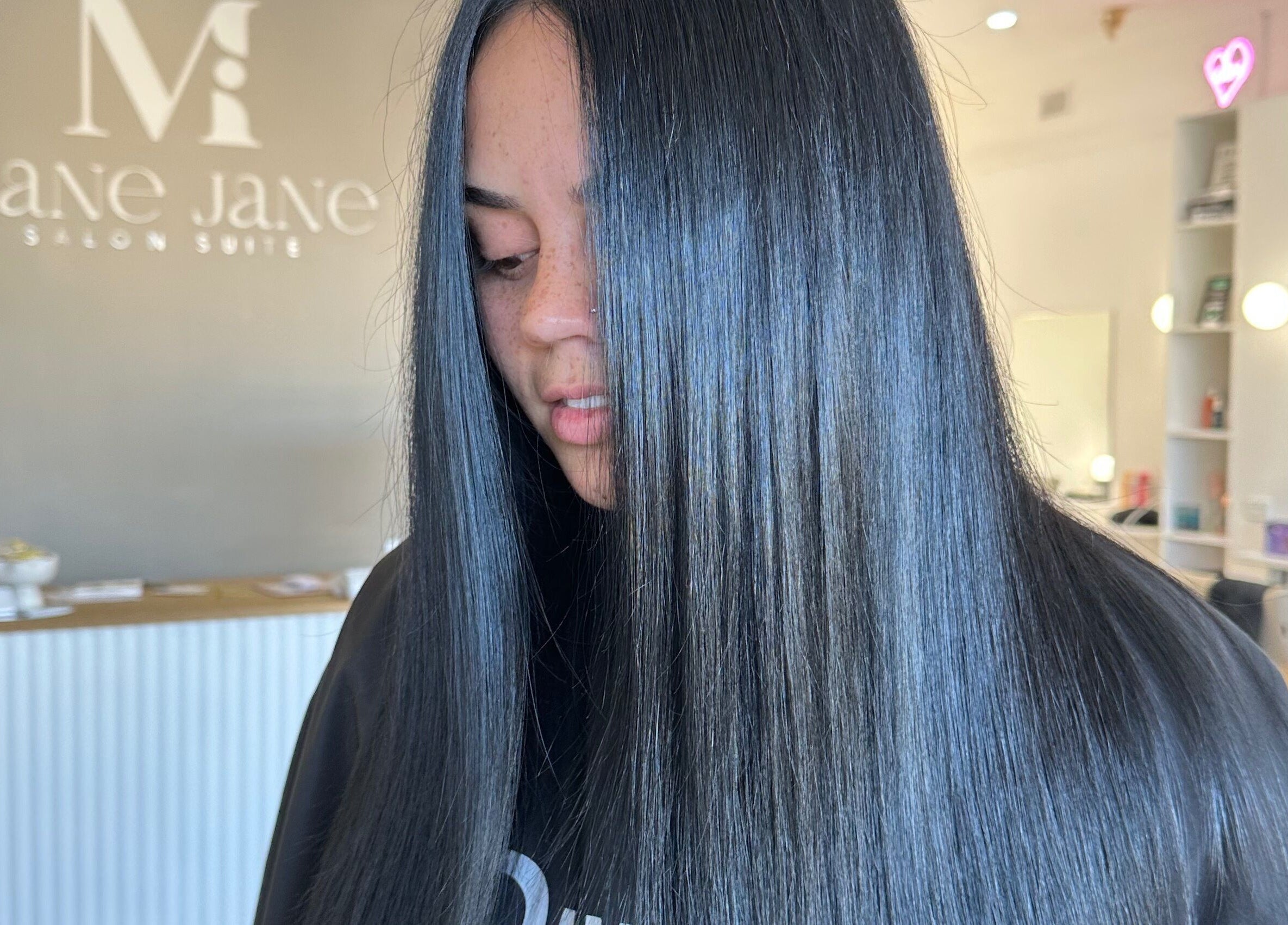 Woman with sleek, straight hair at Styled By Maddie, Ethelton, South Australia, AU.