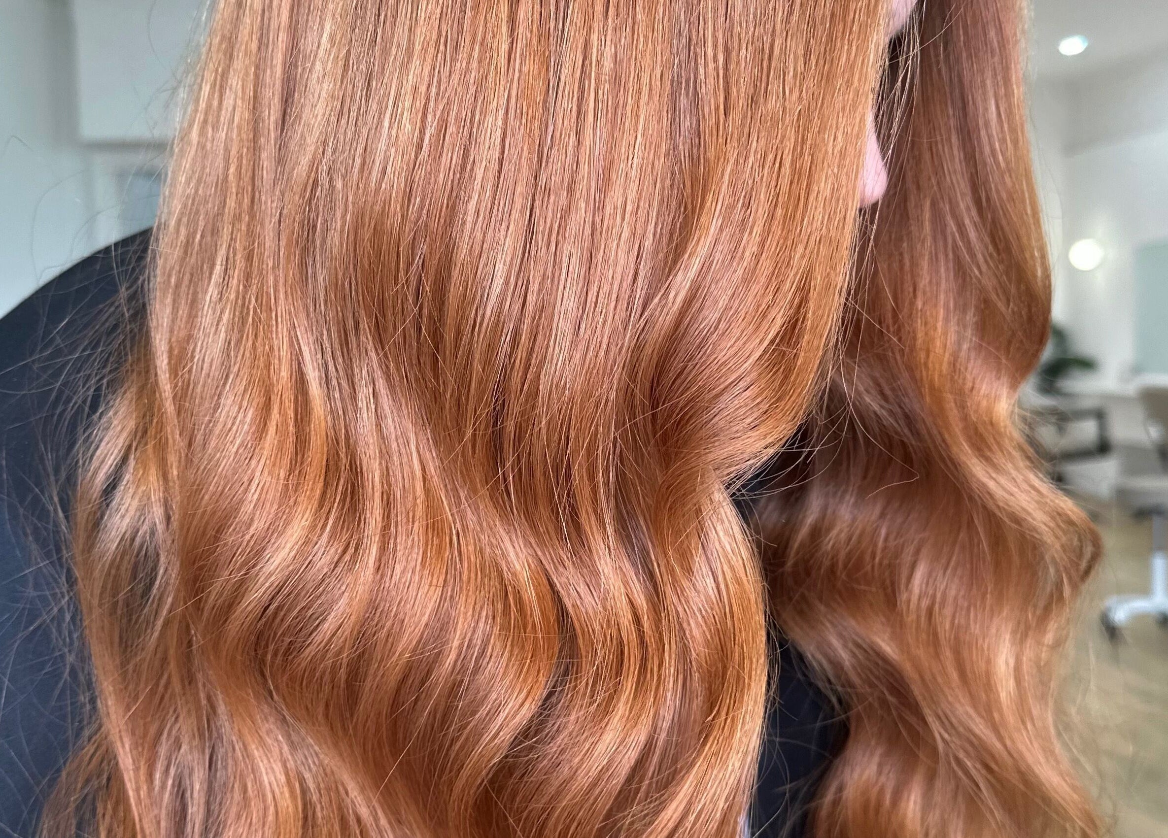 Vibrant wavy hair in Styled By Maddie salon, Ethelton, South Australia, AU showcasing expert styling.