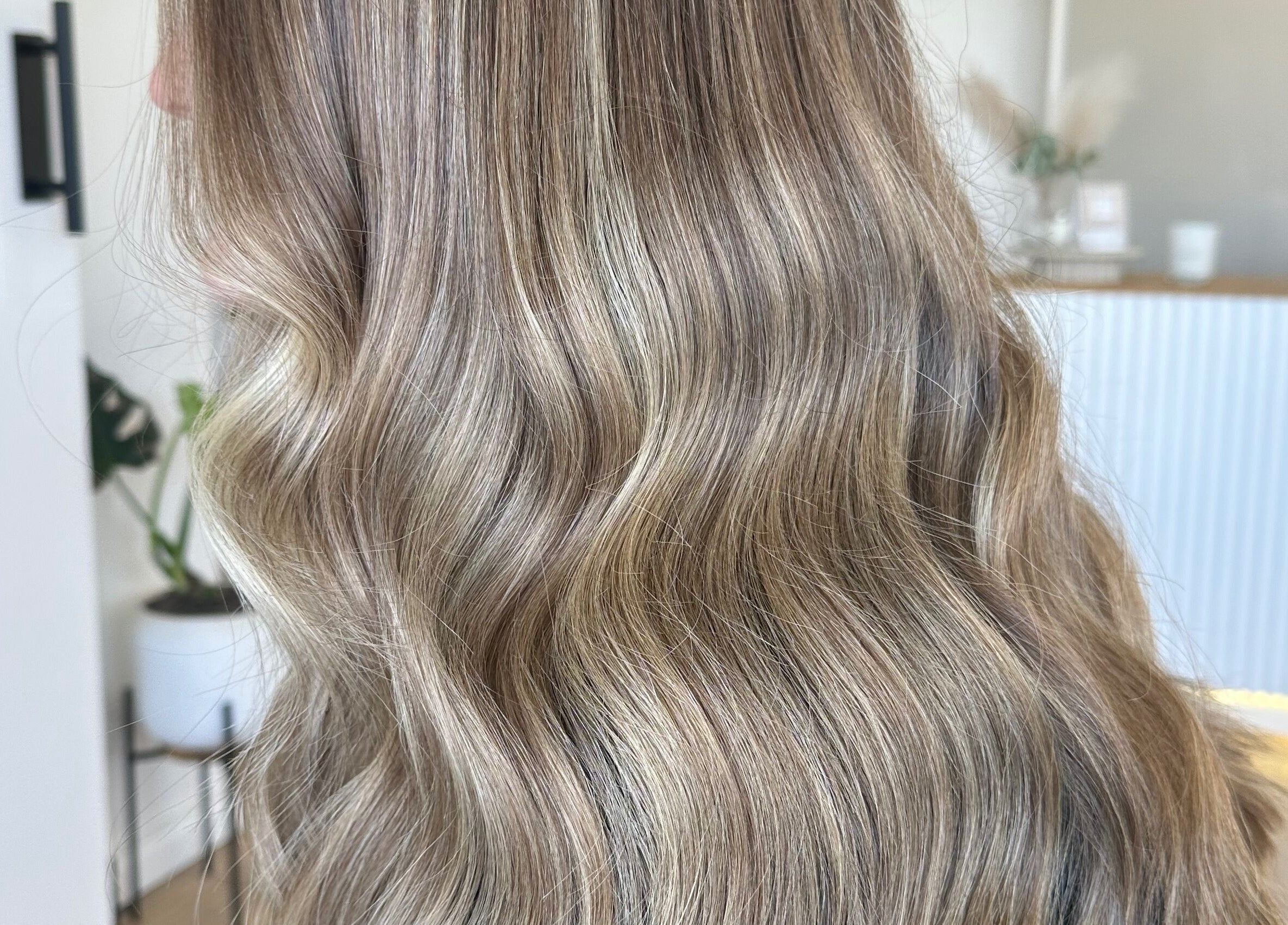 Elegant wavy blonde hair styled at Styled By Maddie, Ethelton, South Australia, AU.