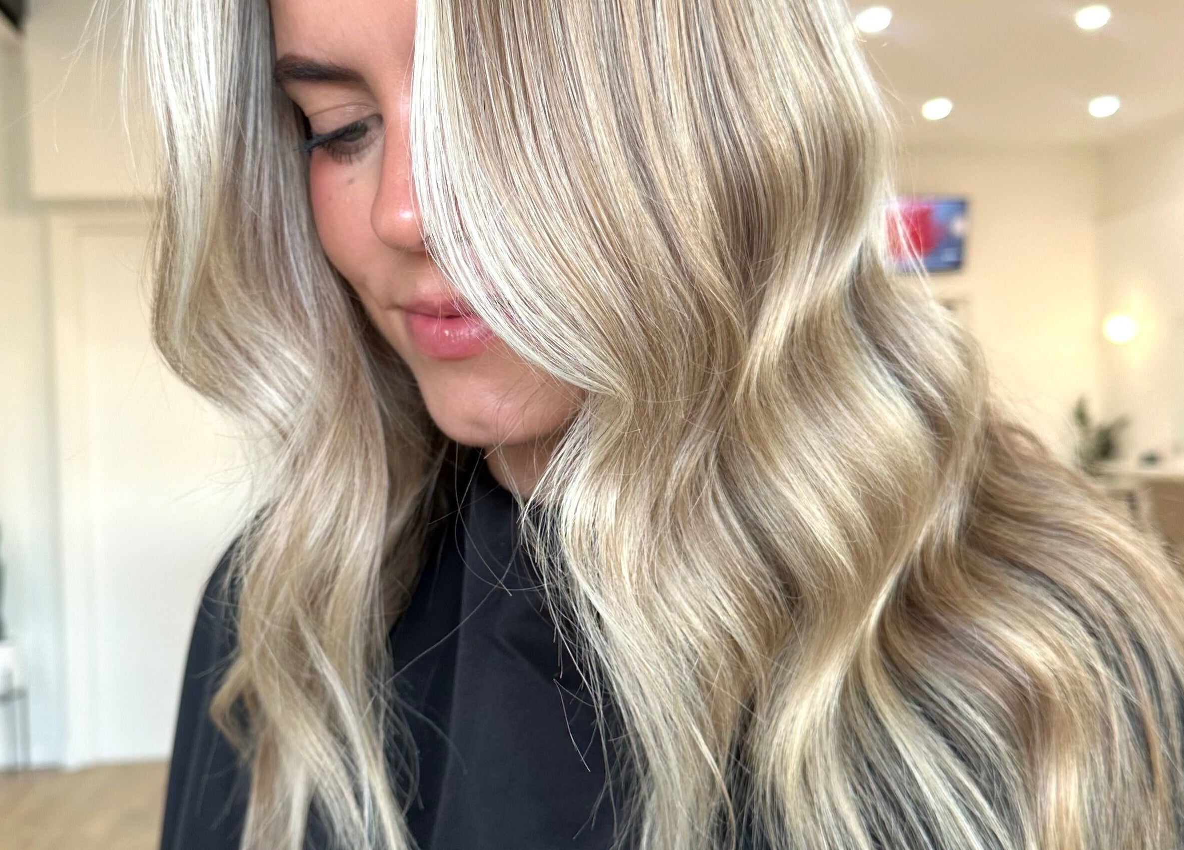 Elegant blonde waves styled at Styled By Maddie in Ethelton, South Australia, AU.