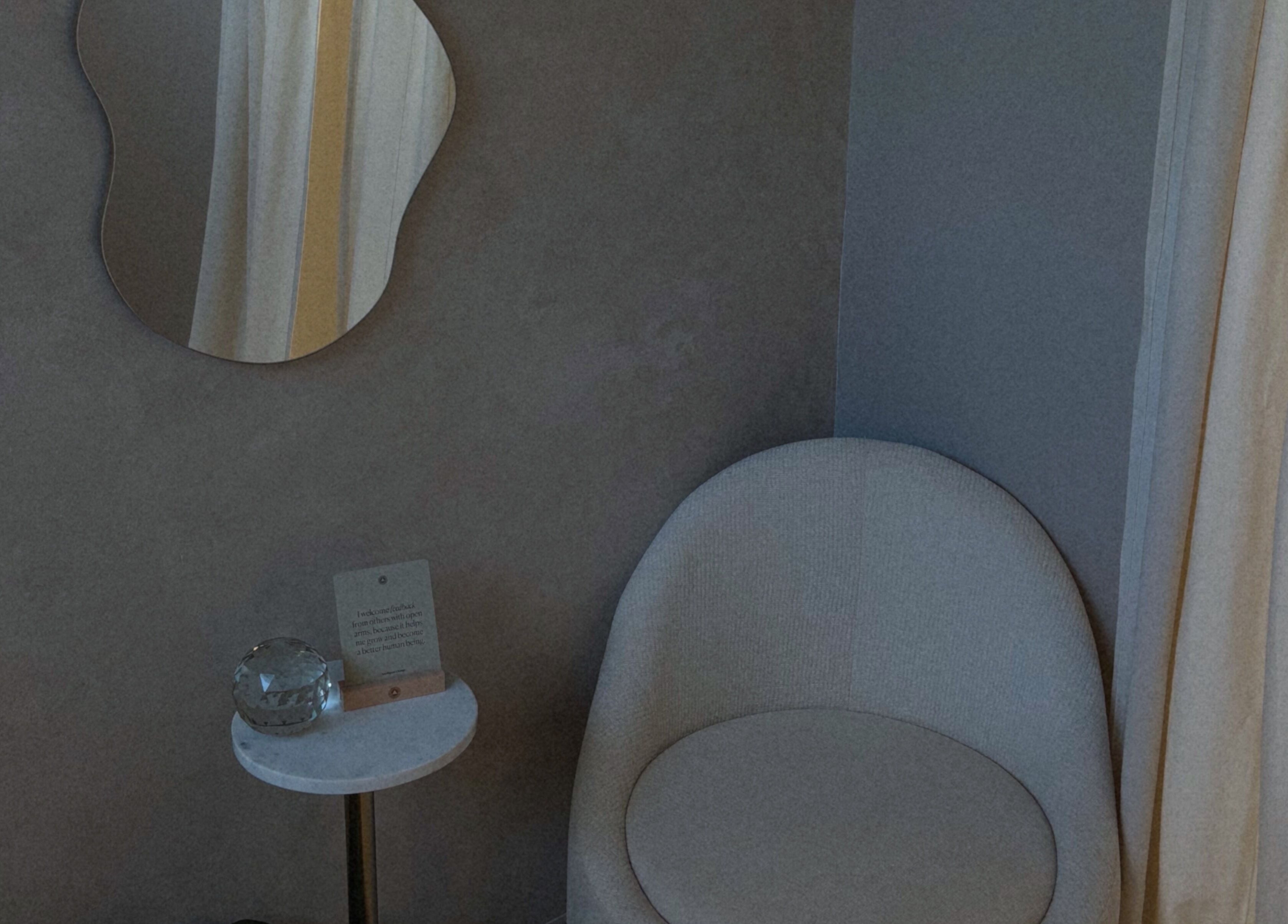 Cozy seating area with a mirror at Blizzthetic, San Juan, San Juan, PR.