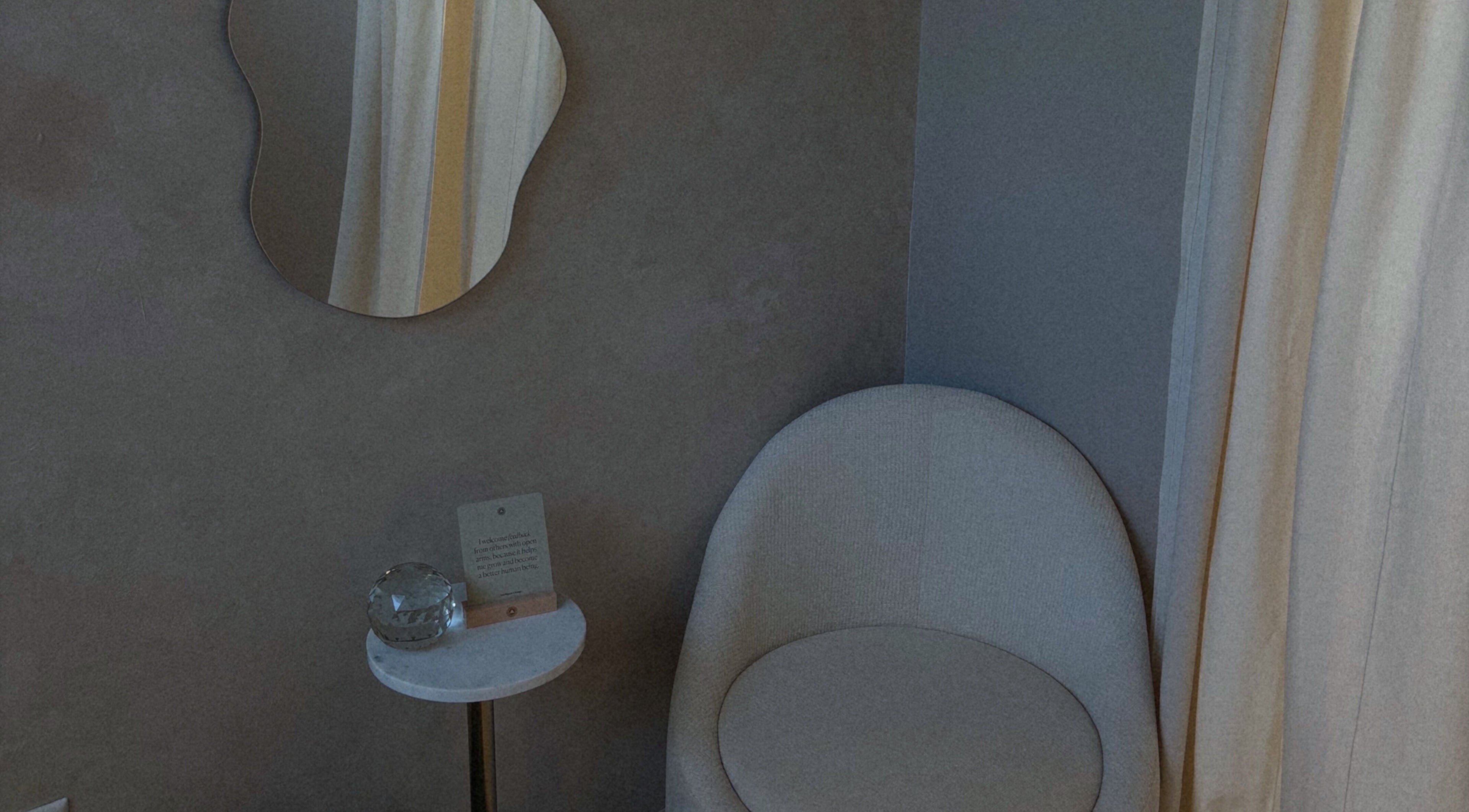 Cozy seating area with a mirror at Blizzthetic, San Juan, San Juan, PR.