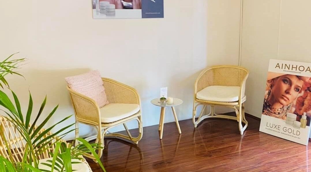 Cozy seating area with rattan chairs at Classique Beauty and Skin, Ellenbrook, Western Australia, AU.