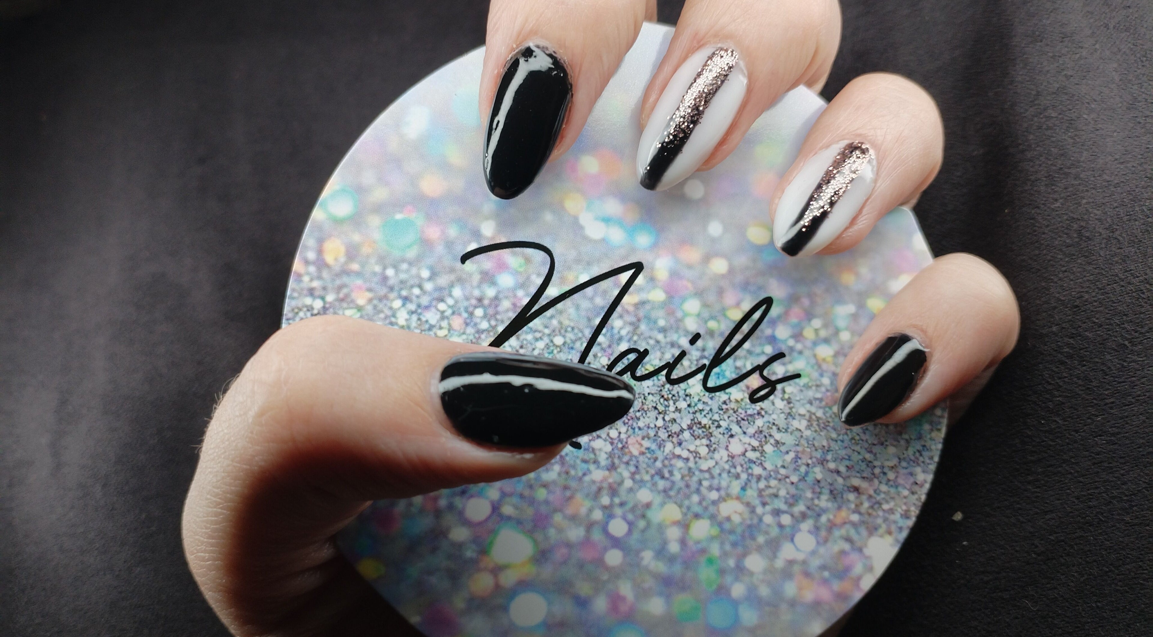 Chic manicured nails with black and glitter at Chella's Beauty and Photography, Emalahleni, Mpumalanga, ZA.