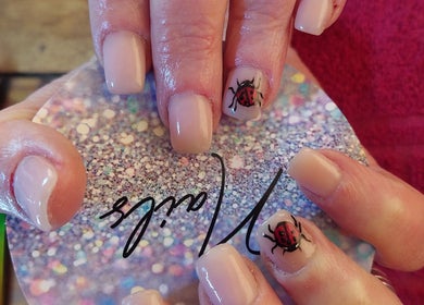 Close-up of ladybug nail art at Chella's Beauty and Photography, Emalahleni, Mpumalanga, ZA.