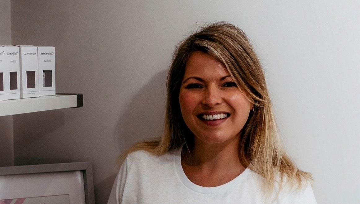 Friendly staff member at The Surrey Skin Clinic, Oxted, England, GB, showcasing welcoming atmosphere.