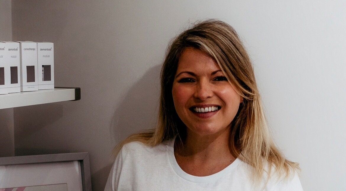 Friendly staff member at The Surrey Skin Clinic, Oxted, England, GB, showcasing welcoming atmosphere.