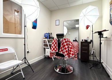 Interior of Sharps The Barber - SC Studio 105 in Manchester, England, GB showcasing a modern barbershop setup.