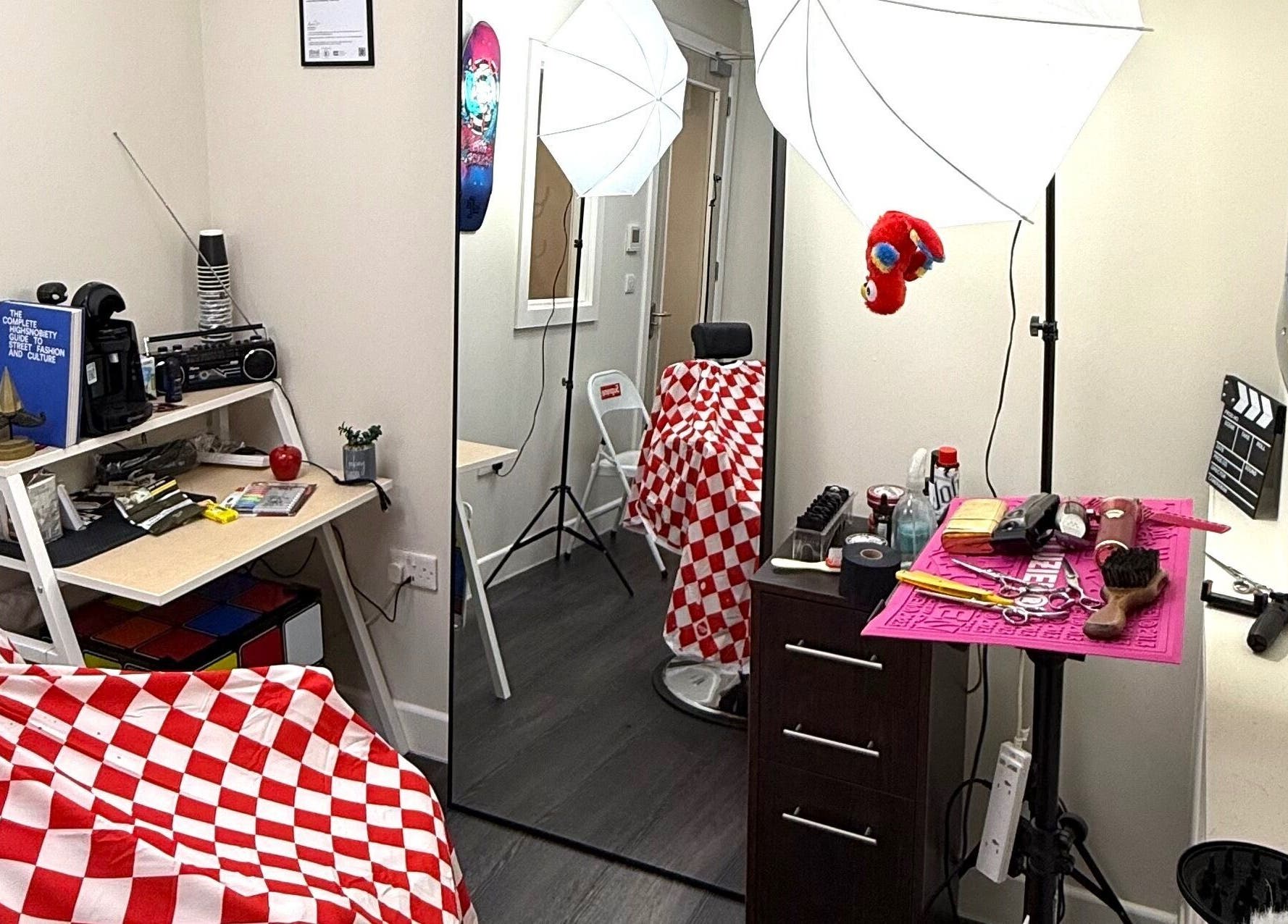 Stylish interior of Sharps The Barber - SC Studio 105 in Manchester, England, GB showcasing modern equipment.