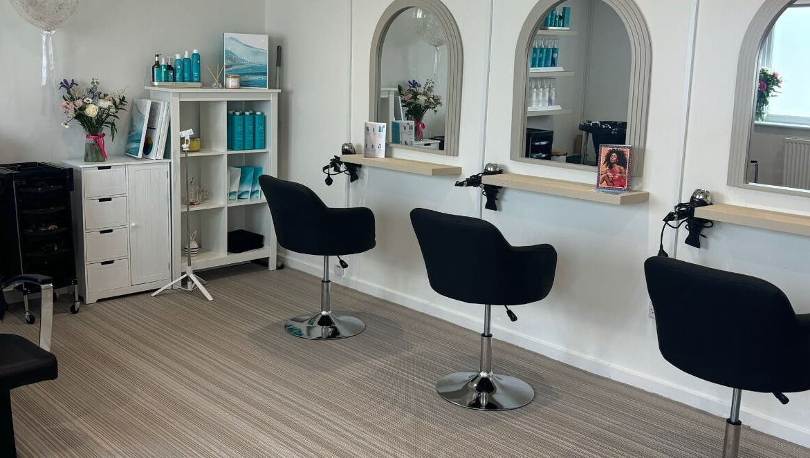 Modern hair salon seating at Summer Rose Hairdressing, East Goscote, England, GB.
