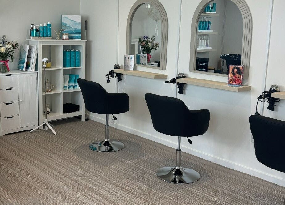 Modern hair salon seating at Summer Rose Hairdressing, East Goscote, England, GB.