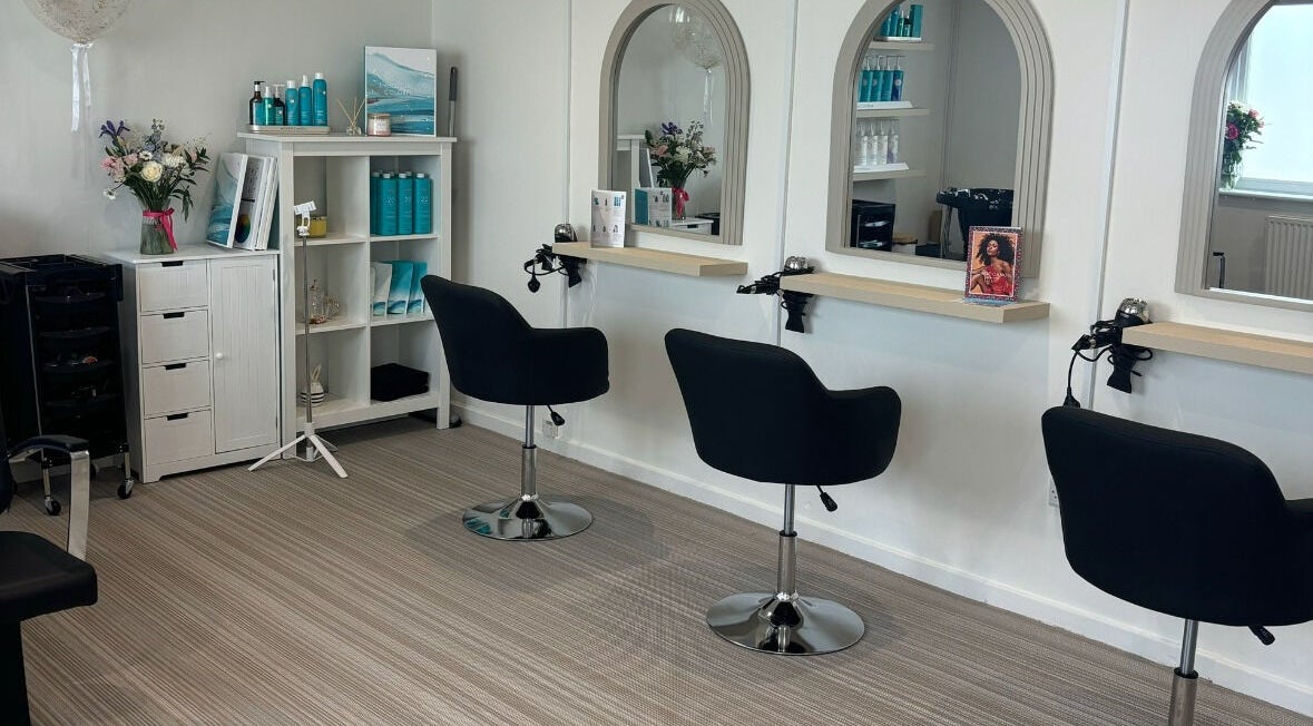 Modern hair salon seating at Summer Rose Hairdressing, East Goscote, England, GB.