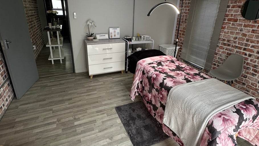 Cozy treatment room at Lizelle Beauty, Aesthetics & Nails, Bloemfontein, Free State, ZA with floral bedding.
