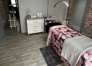 Cozy treatment room at Lizelle Beauty, Aesthetics & Nails, Bloemfontein, Free State, ZA with floral bedding.