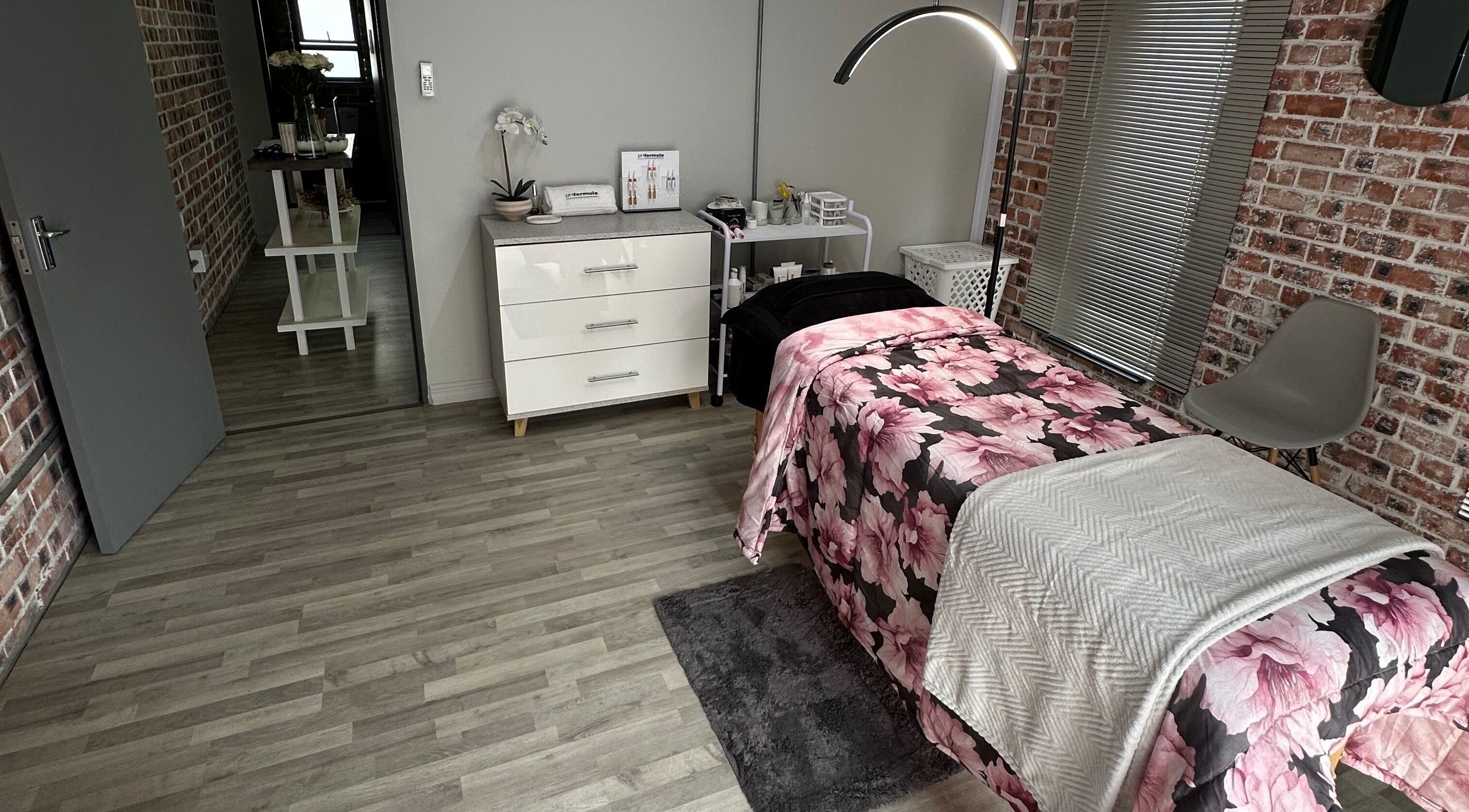 Cozy treatment room at Lizelle Beauty, Aesthetics & Nails, Bloemfontein, Free State, ZA with floral bedding.