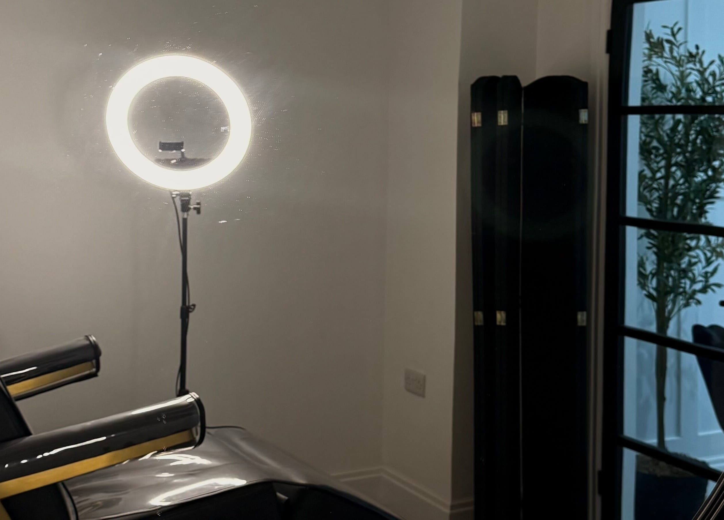 Relaxing beauty chair and ring light setup at Thedermahub, Wallasey, England, GB.