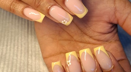 Elegant French manicure with floral detail at Nails by Shekeenah, Ennerdale, Gauteng, ZA.