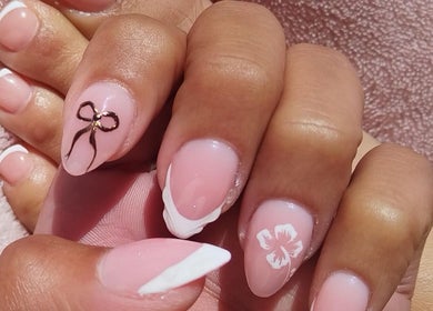 Elegant pink nail art with floral design at Nails by Shekeenah, Ennerdale, Gauteng, ZA.