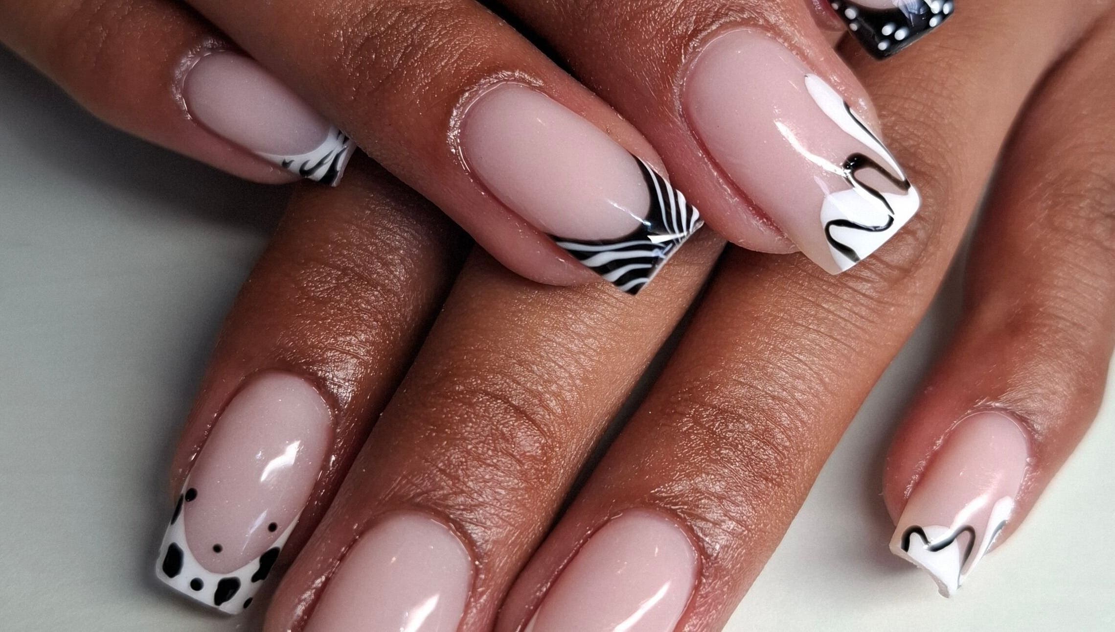 Elegant black and white nail art by Nails by Shekeenah in Ennerdale, Gauteng, ZA, showcases exquisite style.
