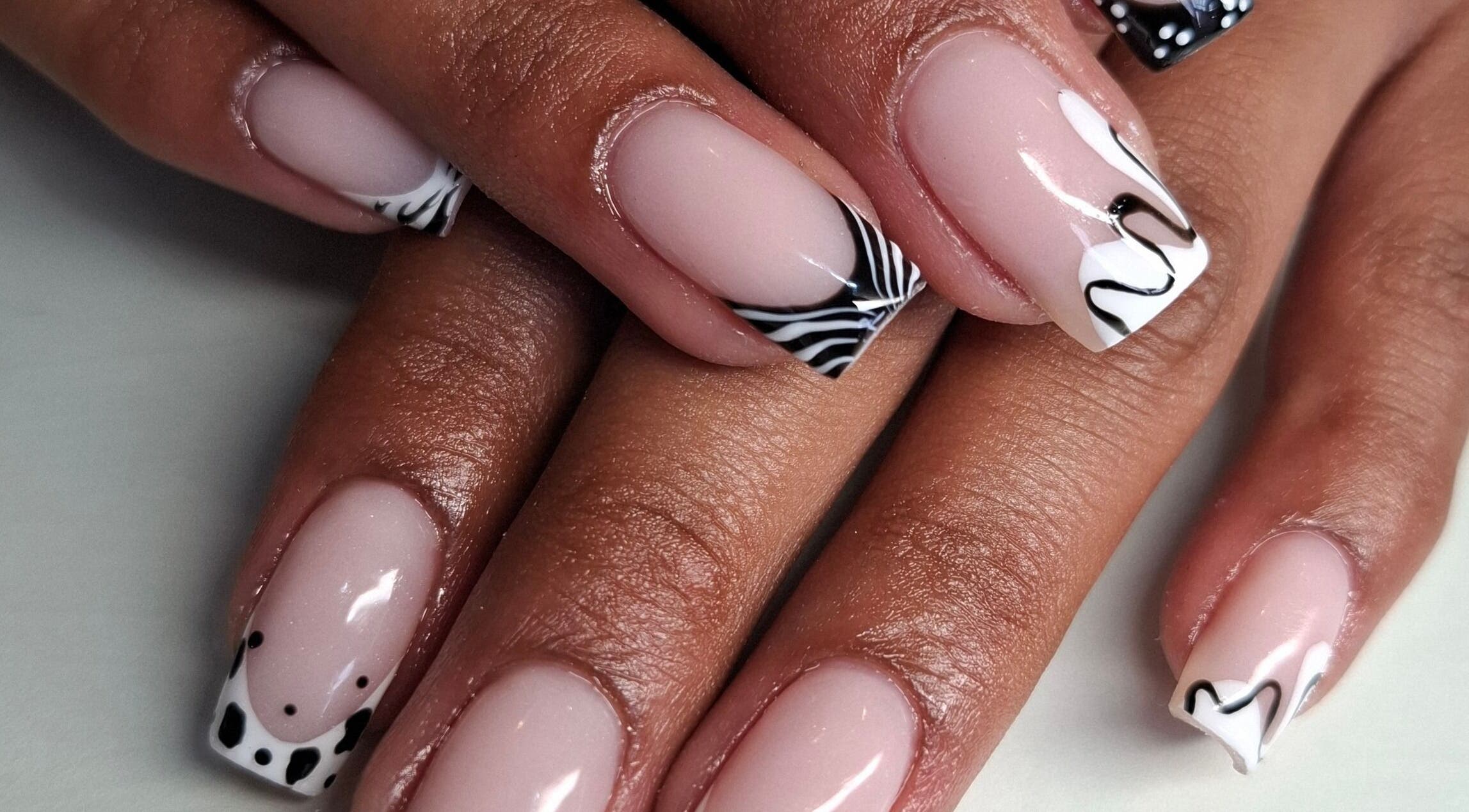 Elegant black and white nail art by Nails by Shekeenah in Ennerdale, Gauteng, ZA, showcases exquisite style.