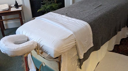 Massage table at KS Holistic Therapies, Bath, England, GB, ready for wellness treatments.