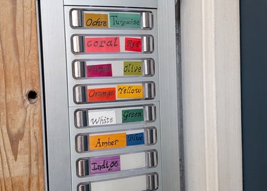 Colorful labeled buttons at KS Holistic Therapies, Bath, England, GB representing various therapy options.