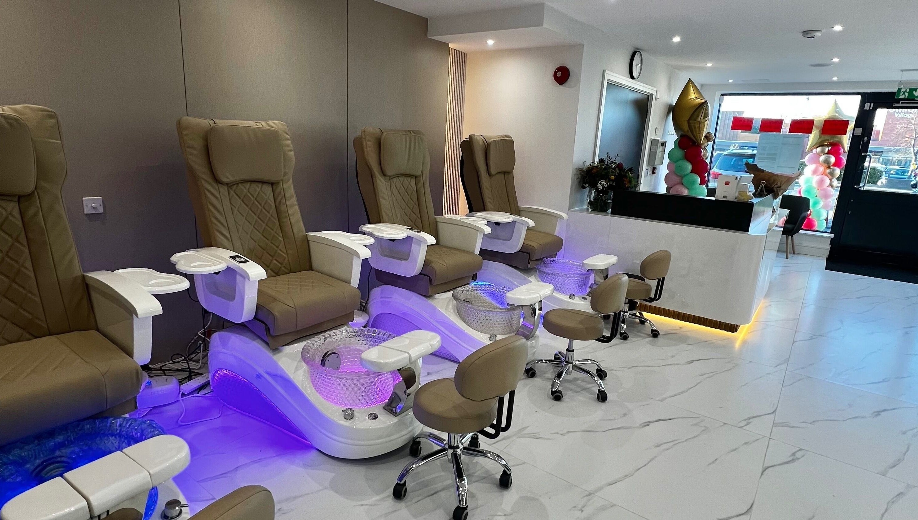 Elegant nail salon seating at Nails Brows Stillorgan, Dublin, County Dublin, IE, with luxurious pedicure chairs.