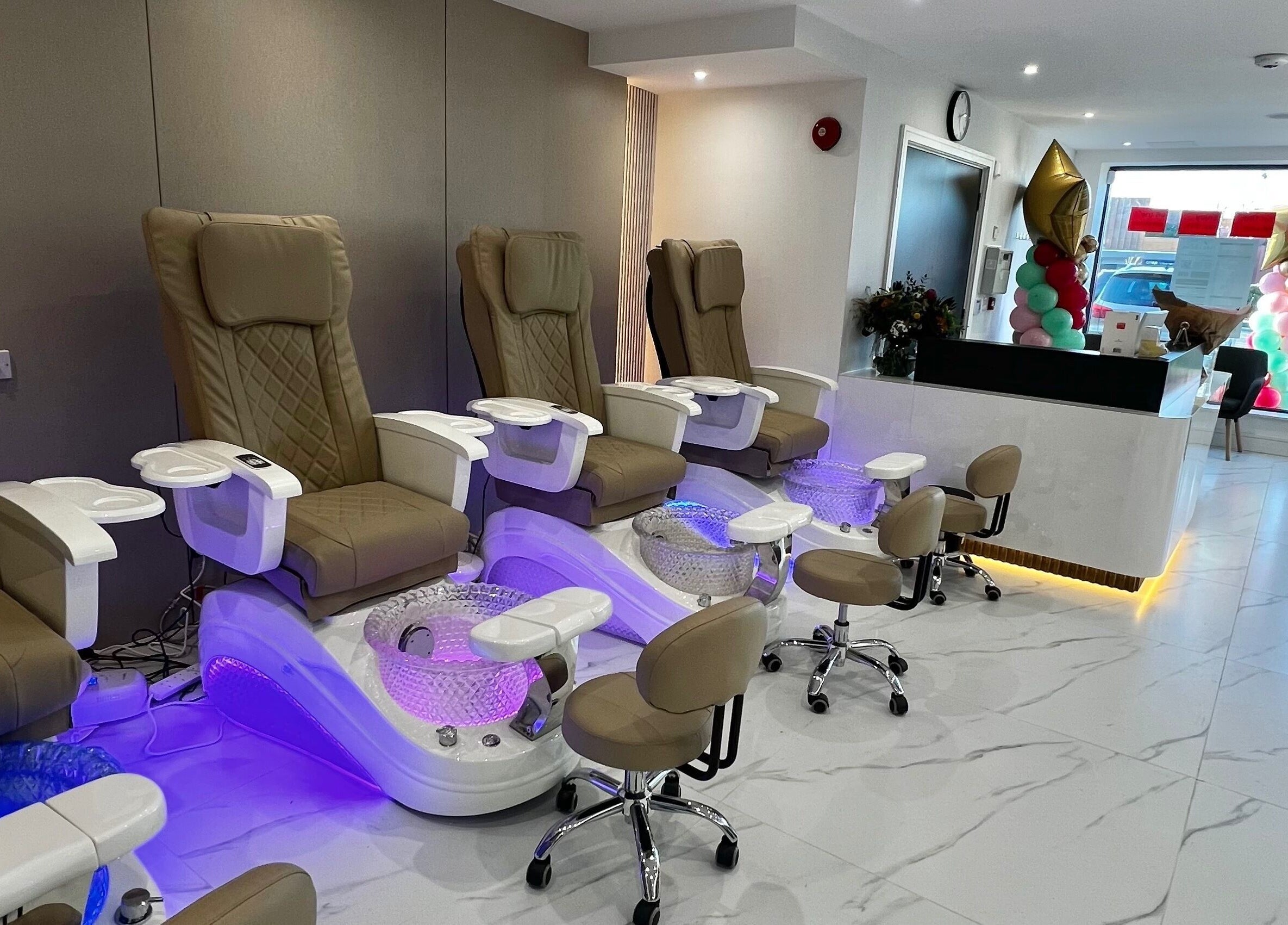 Elegant nail salon seating at Nails Brows Stillorgan, Dublin, County Dublin, IE, with luxurious pedicure chairs.