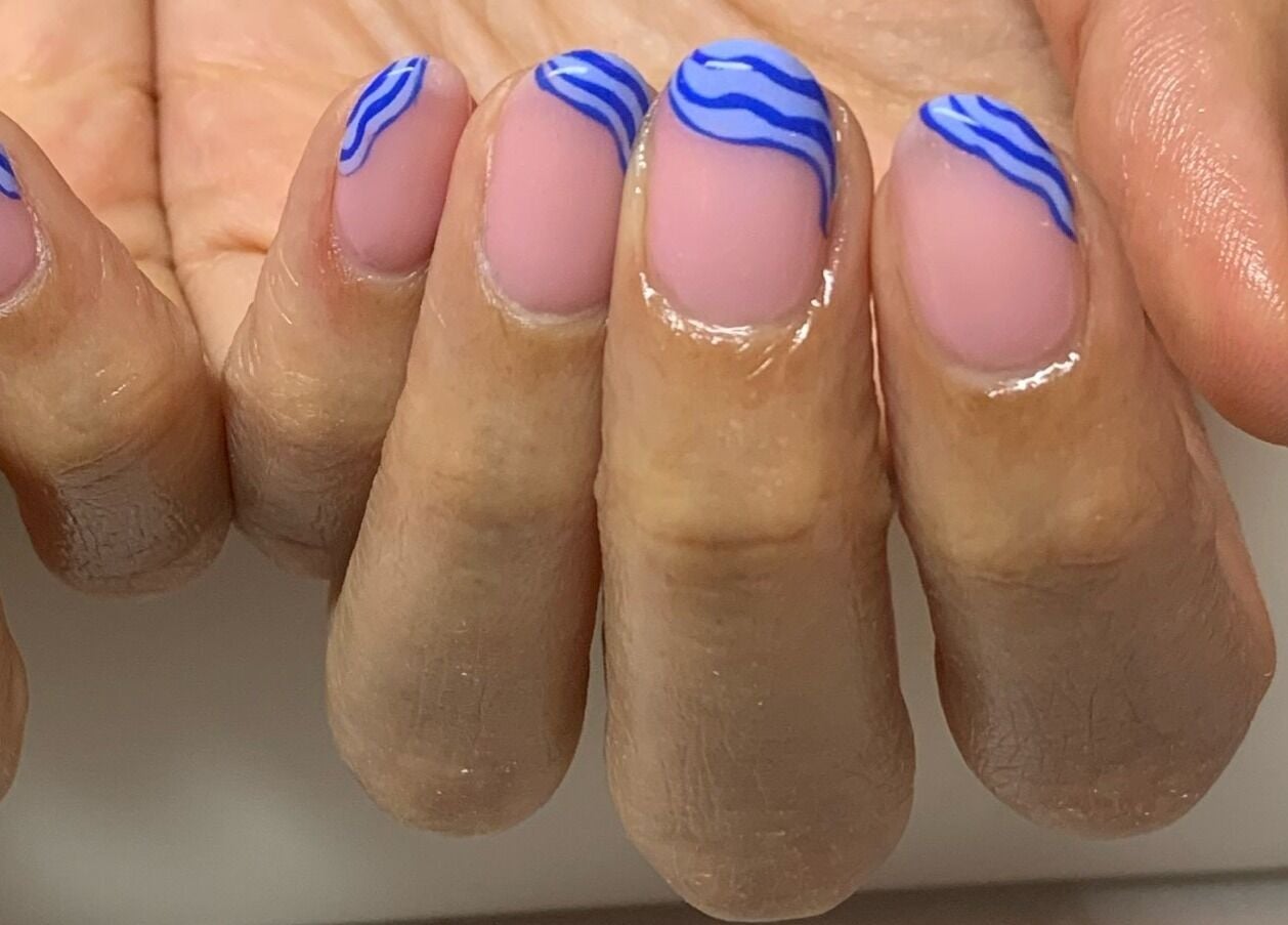 Stylish blue wave nail design at Nails Brows Stillorgan, Dublin, County Dublin, IE.