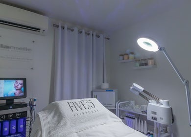 Five Point 5 SkinHouse's serene treatment room in Roodepoort, Gauteng, ZA with modern skincare equipment.