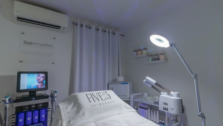 Tranquil beauty room at Five Point 5 SkinHouse, Roodepoort, Gauteng, ZA, featuring advanced skincare equipment.