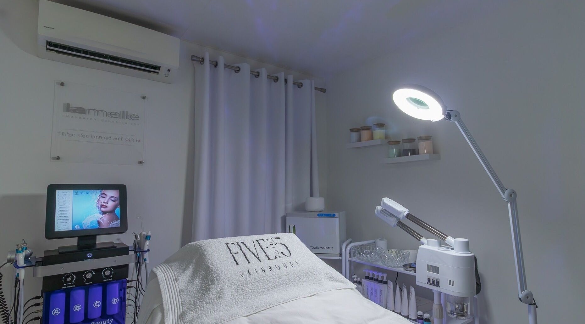 Tranquil beauty room at Five Point 5 SkinHouse, Roodepoort, Gauteng, ZA, featuring advanced skincare equipment.