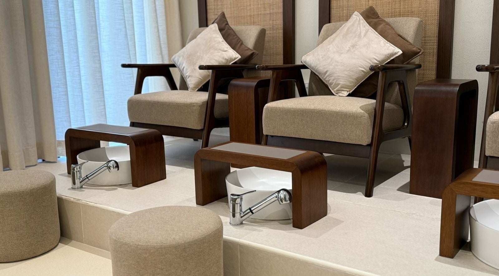 Comfortable pedicure chairs at Able Beauty Lounge, Kabir, Emirate Of Umm Al Quwain, AE, offering a relaxing vibe.