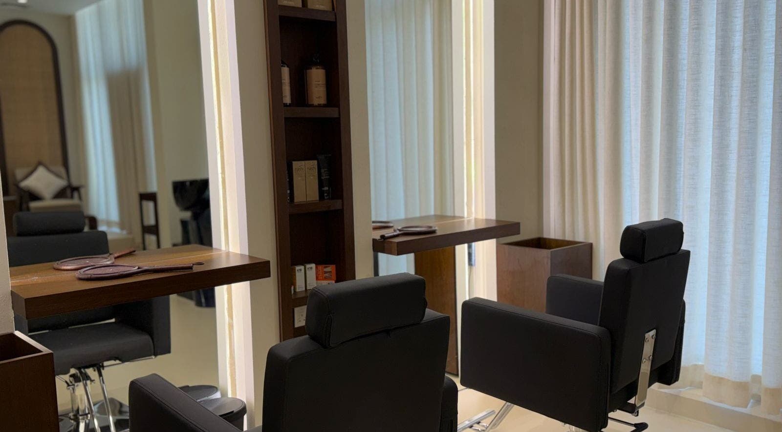 Luxurious salon chairs at Able Beauty Lounge in Kabir, Emirate Of Umm Al Quwain, AE, showcasing modern elegance.