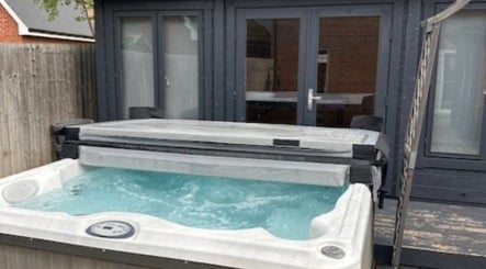 Outdoor hot tub at Mobile Massage & Relax in Runwell, England, GB offering serene relaxation.