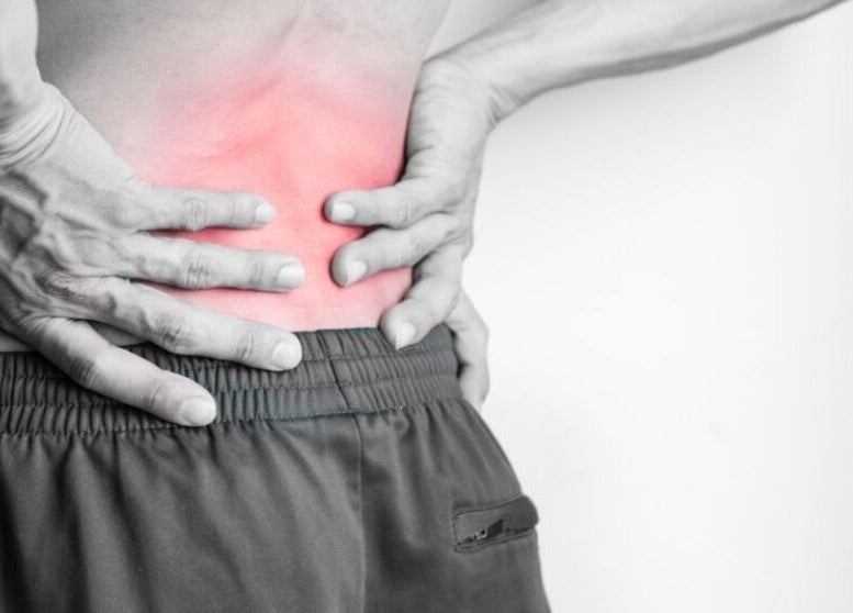 Back pain relief focus for Mobile Massage & Relax (The Zen Den) in Runwell, England, GB. Hands provide soothing support.