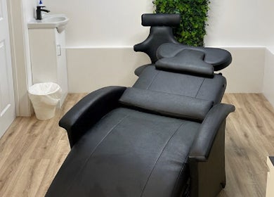 Elegant treatment room at Skyn Deep Beauty, Lossiemouth, Scotland, GB with a plush reclining chair.