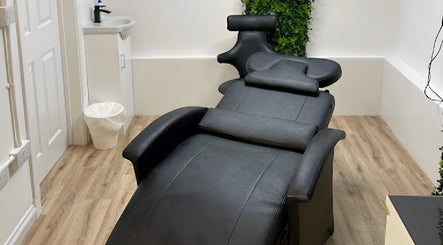 Elegant treatment room at Skyn Deep Beauty, Lossiemouth, Scotland, GB with a plush reclining chair.