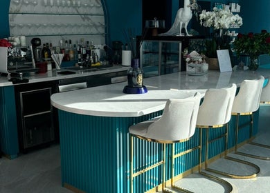 Stylish bar area at Velvet & Pearls Beauty Club, Limassol, Limassol, CY featuring modern decor and seating.