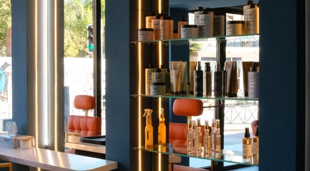 Product shelves at Velvet & Pearls Beauty Club, Limassol, Limassol, CY glistening with luxury beauty items.