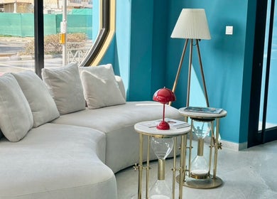 Cozy seating area at Velvet & Pearls Beauty Club, Limassol, CY with elegant decor and soft lighting.