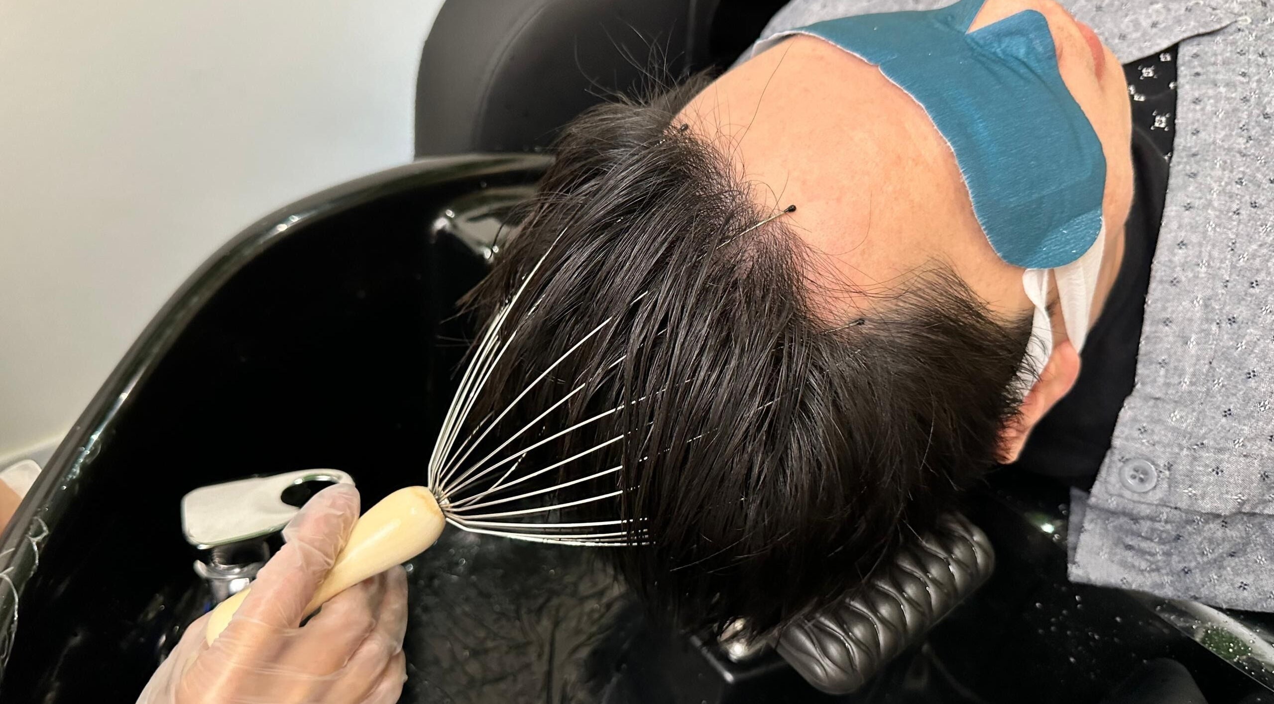 Relaxing scalp treatment at Hanalab Head & Wellness Spa, Singapore, Singapore, SG with soothing head massage.