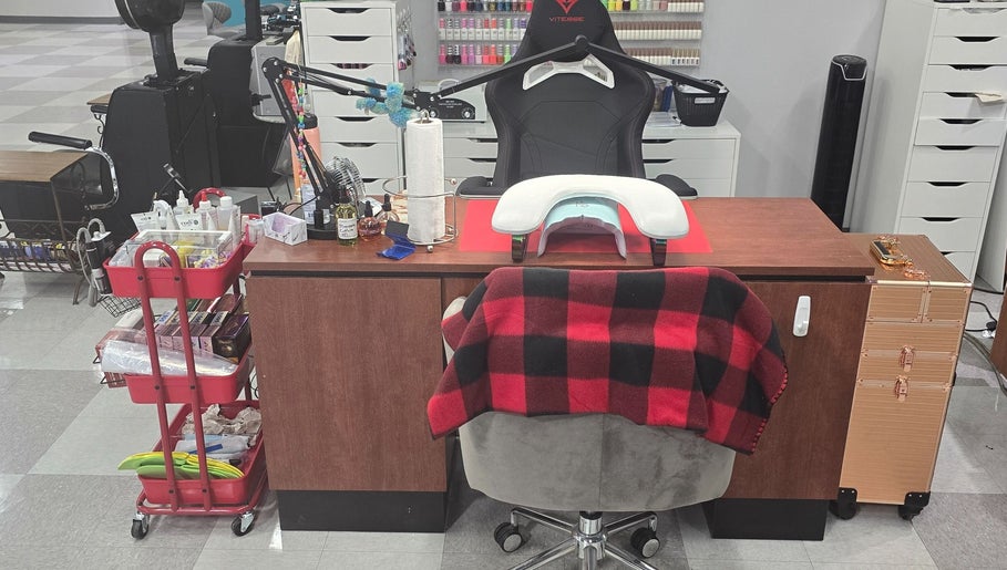 Nail station at Sasco Nails in Henderson, Nevada, US featuring a plush chair and organized tools.