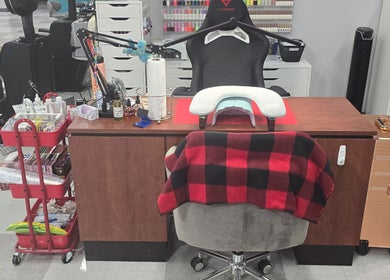 Nail station at Sasco Nails in Henderson, Nevada, US featuring a plush chair and organized tools.